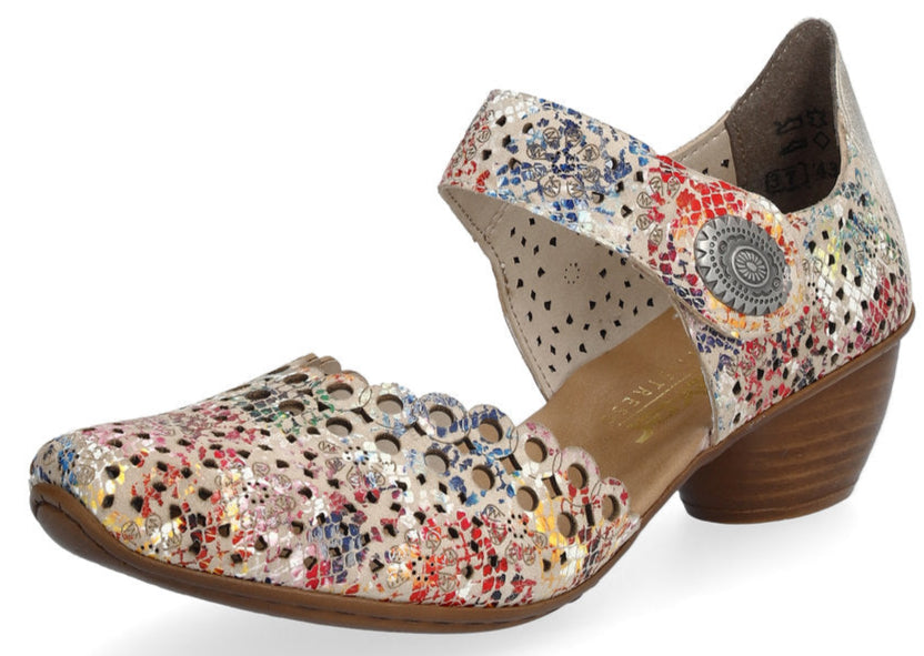 Floral, decorative heeled pump shoe with a scalloped edge and ankle strap.