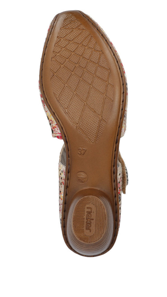 Shoe sole with diamond pattern.