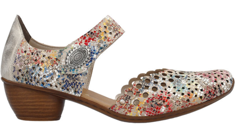 Mary Jane-style pump shoe with colorful floral print, silver heel and ankle strap with button detail.
