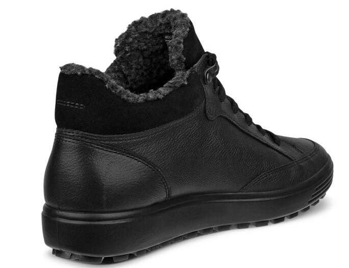 Black leather ankle boot with shearling lining.