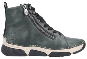 Side-view of an ankle-high, lace-up dark green shoe with a side zipper and a layered black-and-beige sole.