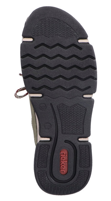 Sole of a shoe featuring a patterned black rubber tread with red and white accents.