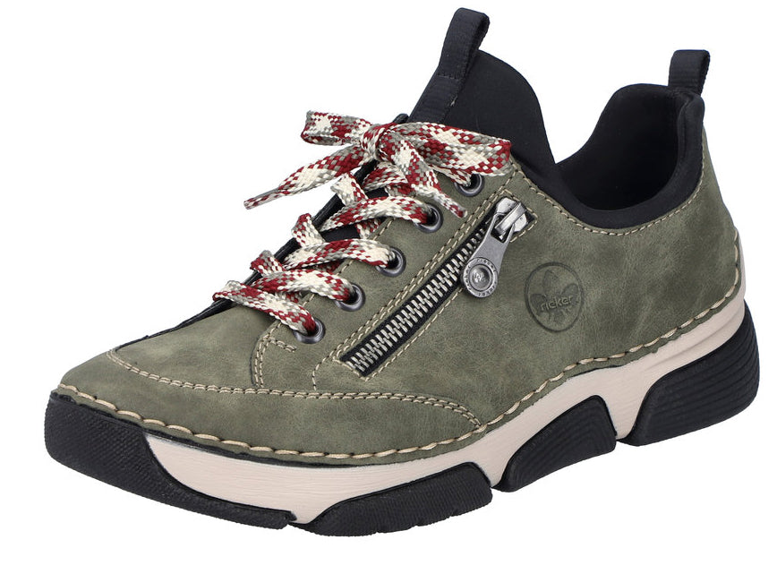 Green casual shoe with decorative zipper, white laces, and black sole.