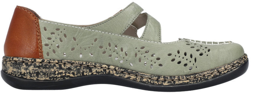 A green leather Mary Jane style shoe with cutouts, brown heel and black sole.