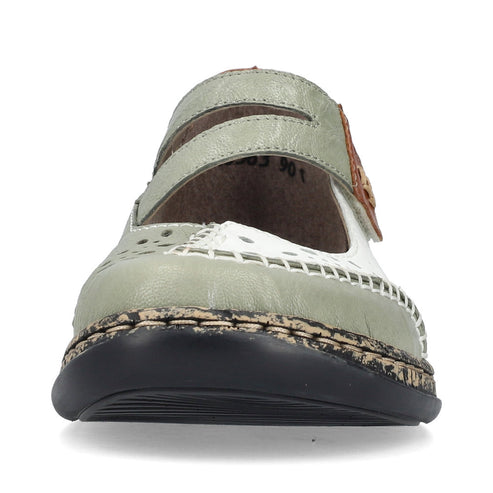 Pale green and white Mary Jane style shoe with a strap.