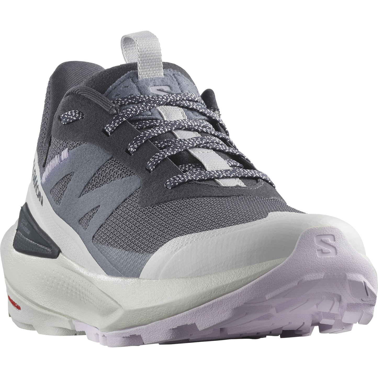 A gray and white low top trail running shoe with a lug sole and visible laces.