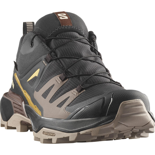 A dark gray high-top hiking shoe with tan accents and brown laces.