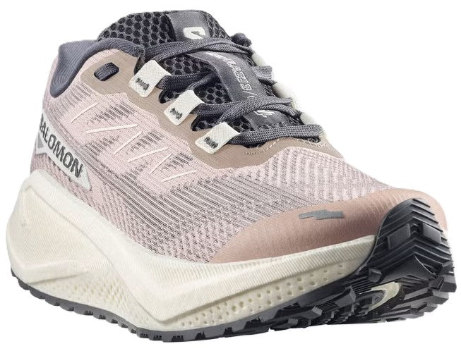 Running shoe with pink and gray upper, prominent white midsole, and black outsole; 'SALOMON' is printed on the side.