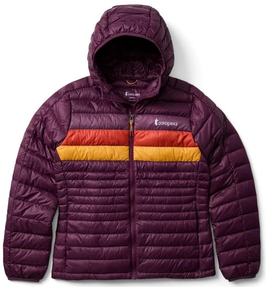A plum-colored, hooded, down-filled puffer jacket with a full-zip front and horizontal quilting. A wide orange and yellow striped band crosses the chest, and the Cotopaxi logo is visible on the upper left chest.