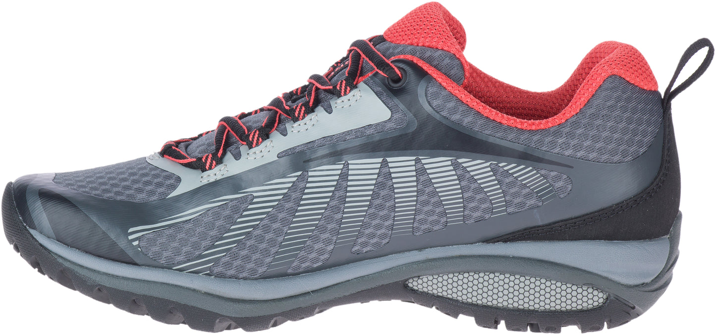 A gray and red athletic shoe with a pull tab on the back.