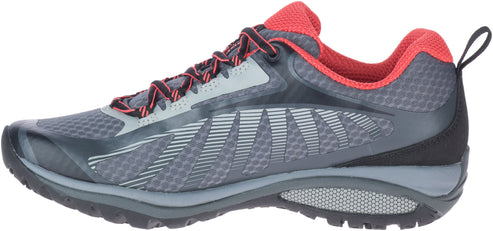 A gray and red athletic shoe with a pull tab on the back.