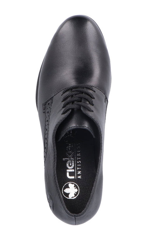 Black leather dress shoe with a lace-up closure, seen from above with "rieker ANTISTRESS" visible on the insole.