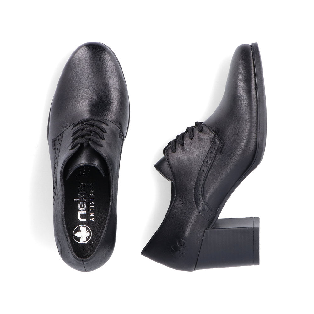 Overhead shot of two black leather lace-up block heel dress shoes.