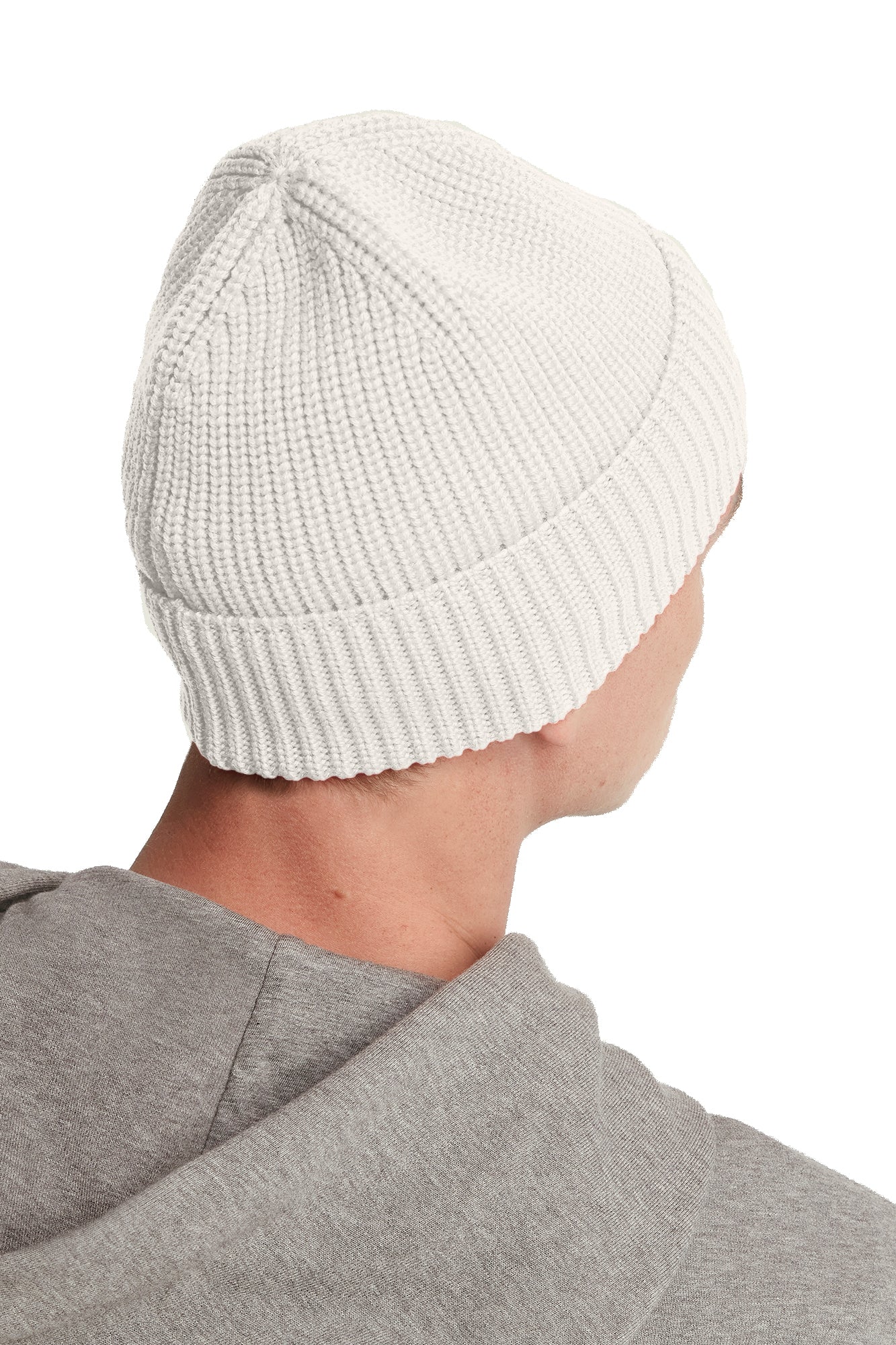 Person wearing a ribbed, knit beanie cap.