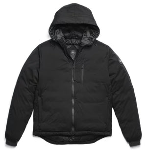 A black, insulated puffer jacket with a hood, a front zipper, a chest pocket, and a small round logo patch on the left upper sleeve.