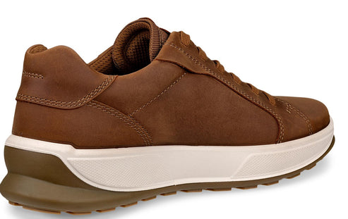 Brown leather sneaker with white midsole and brown outsole.