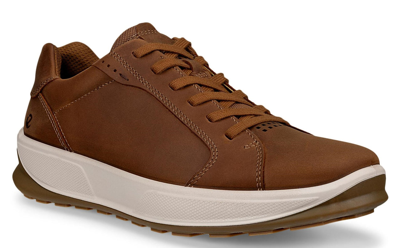 A brown leather sneaker with a white sole and brown laces.