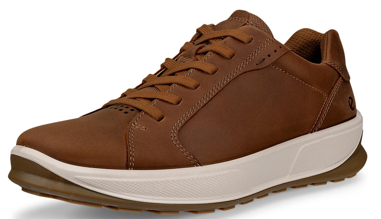 A brown leather athletic shoe with a white midsole and brown outsole.