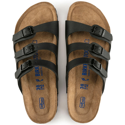 Two black three-strap sandals displaying size 38.