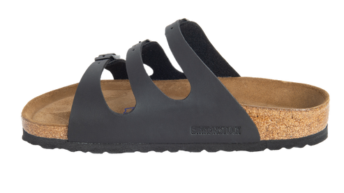 Black sandal with three straps and buckle.