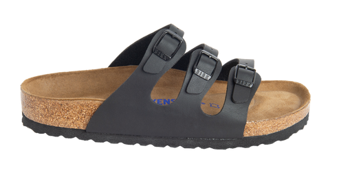 Black sandal with three straps and adjustable buckles.