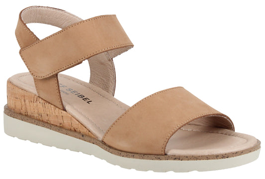 Beige leather sandal with a cork wedge heel and white sole, featuring an adjustable Velcro strap.