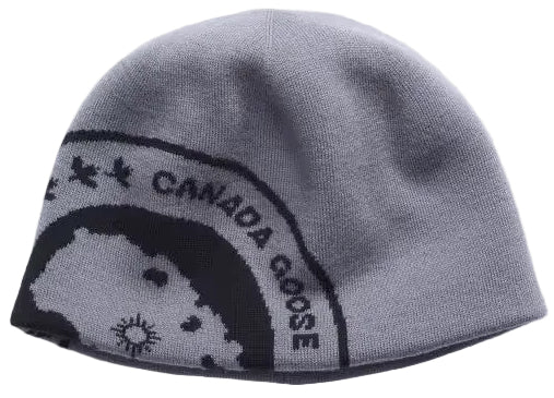 A gray knit beanie with a partial black graphic featuring the text 'CANADA GOOSE' and a circular icon.
