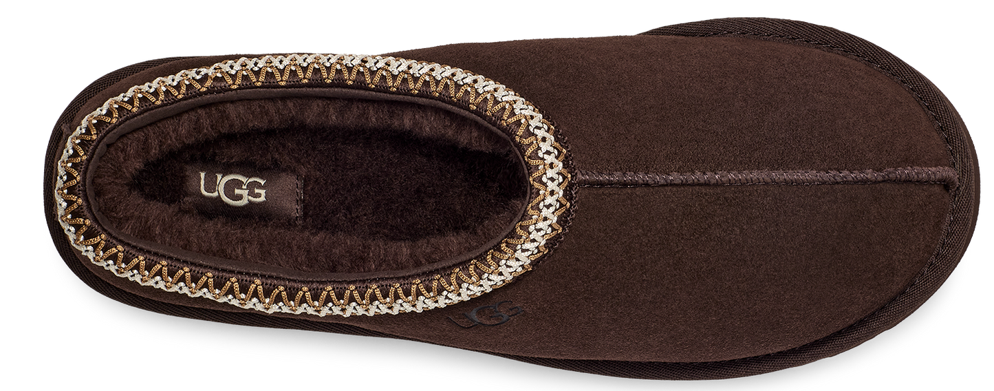Brown slipper with a decorative trim.