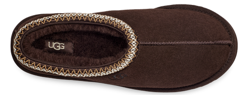 Brown slipper with a decorative trim.