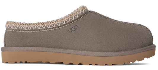 Taupe slipper with textured trim and thick sole.