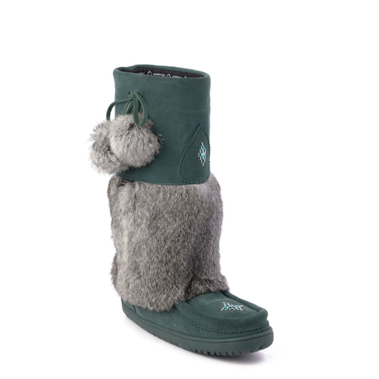Green moccasin style boot with grey fur and pom poms