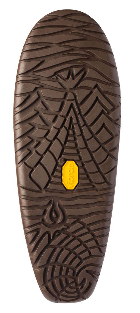 Brown shoe sole with textured pattern and yellow logo in the center.