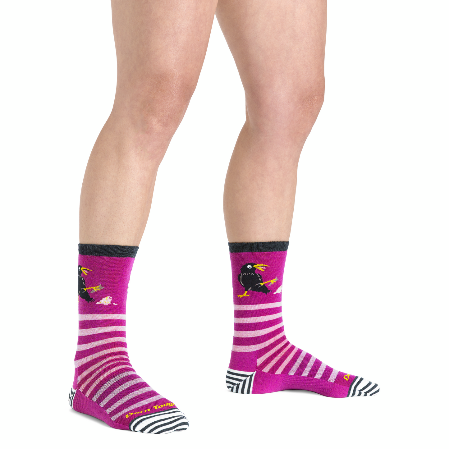 Ankle high socks with a black top band, with pink stripes and black bird graphic.