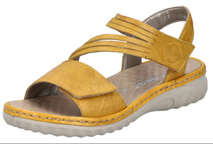 A yellow sandal with multiple straps and velcro closures.