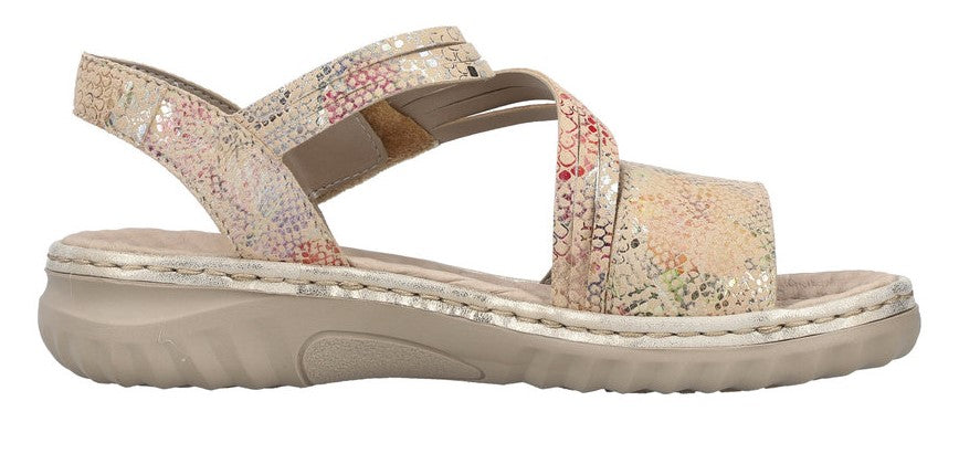 A beige sandal with criss-cross straps and a slingback.