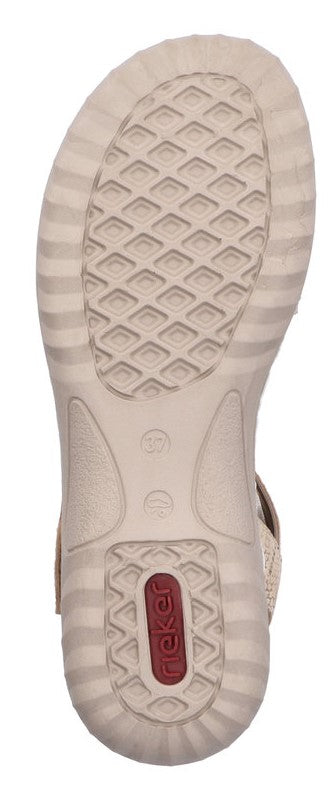 Bottom view of a shoe sole with geometric patterns and rieker text.