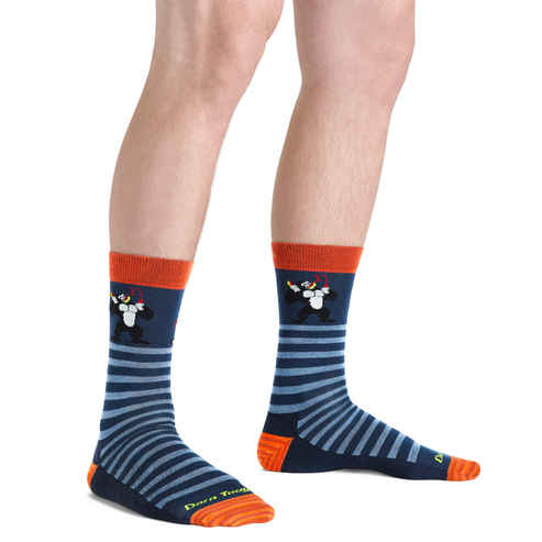 Pair of navy socks with grey stripes, orange heel and cuff, and a tuxedo cat design on the outer ankle.