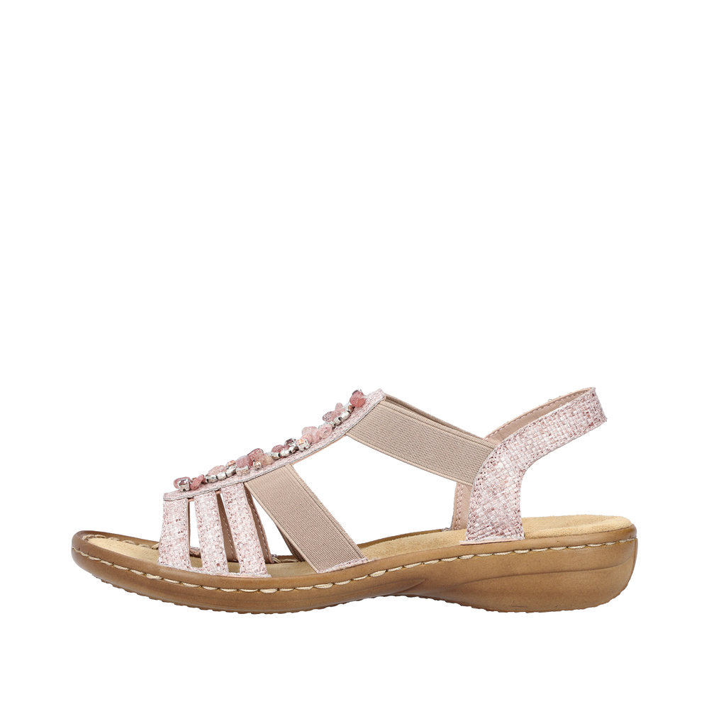 Glittery pink sandal with bead embellishments and elastic straps.