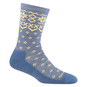 Blue sock with snowflakes and diamond patterns.