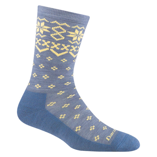 Blue sock with snowflakes and diamond patterns.