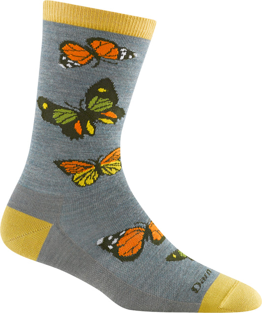 Crew-length sock with colorful butterfly pattern and yellow reinforced heel and toe.