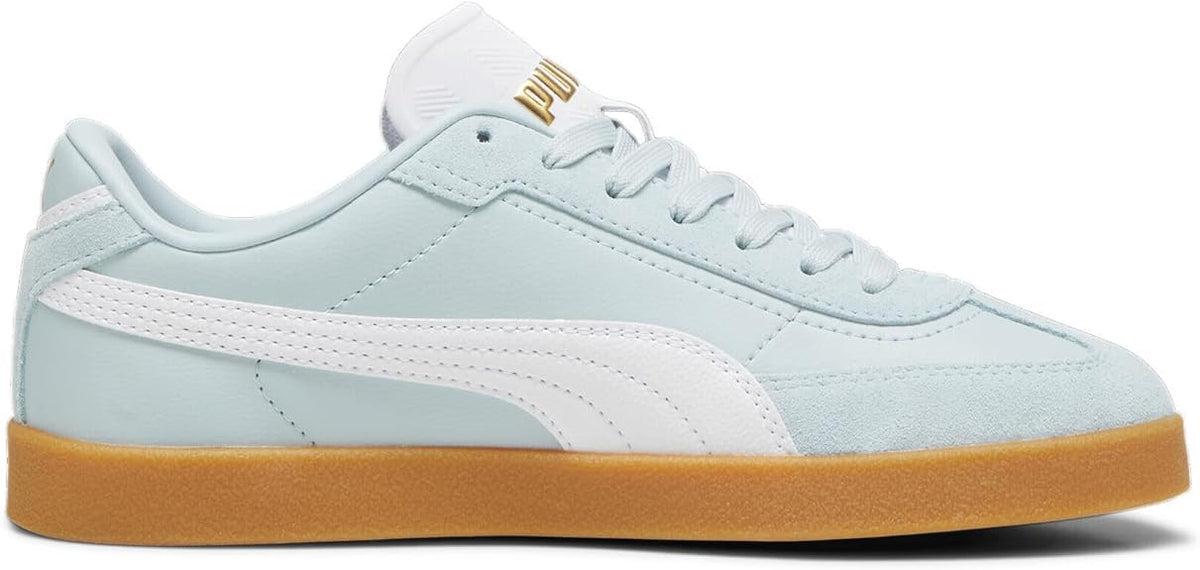 A light blue sneaker with white stripes and a brown sole.
