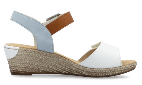 Wedge sandal with white toe strap, blue and tan ankle strap, and woven wedge heel.