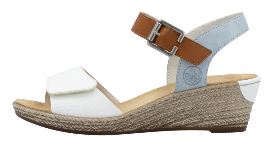 White wedge sandal with brown strap and silver buckle.