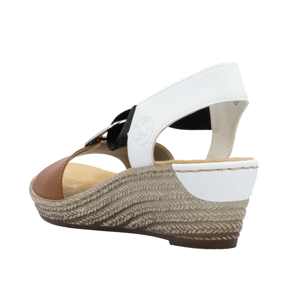 Wedge sandal with brown front, white and black strap, and beige sole.