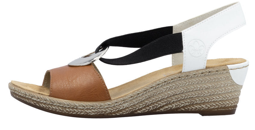 Side view of a brown, black and white wedge sandal with silver hardware and a braided sole.