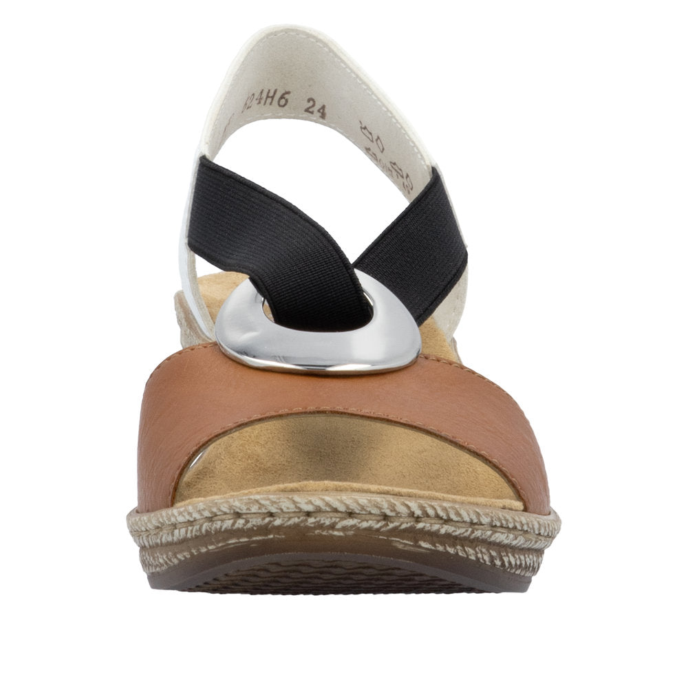 Front view of a brown, black, white and silver sandal with espadrille-style soles.