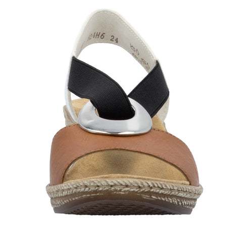Front view of a brown, black, white and silver sandal with espadrille-style soles.