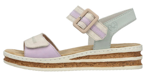 Platform sandals with a hook-and-loop toe strap and a hook-and-loop ankle strap with a decorative buckle.