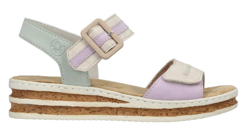 A platform sandal with lavender and cream-colored straps with an adjustable ankle strap and buckle, and a cork-like midsole.